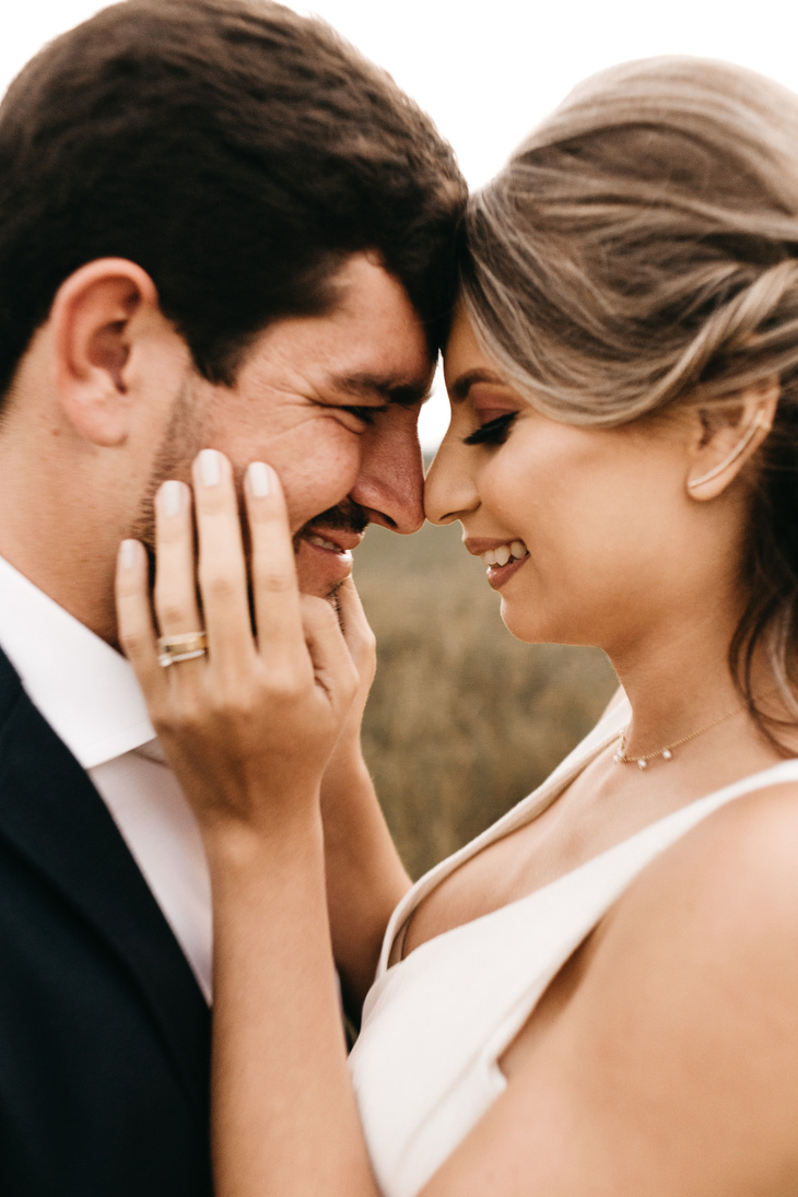 Man and Woman Standing Facing Each Other